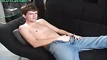 Cam beautiful twink on sofa jerks big cock and cumshot
