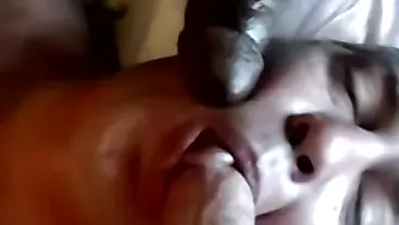 Chubby man receives cum in mouth in interracial threesome