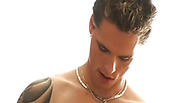 Hot tattooed stud posing for the camera and jerking off