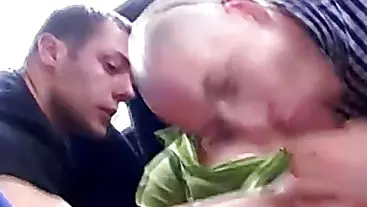 Handsome gay travelers having sex in the bus during the ride