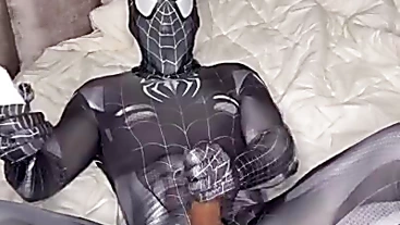 Levy Wilgen jerks off in a Spiderman costume with a dildo in his ass