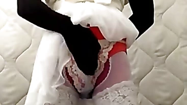 black nylon doll with short white wedding dress