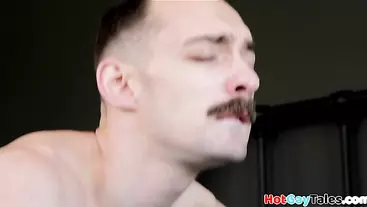 Moustache cocksucker barebacked by tattooed stud indoors