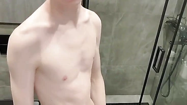 Cute twink shows his hung cock