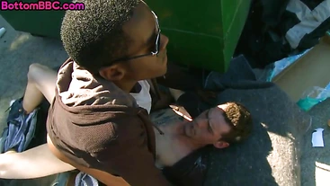 Nubian bottom gets fucked outdoor in public by white stud