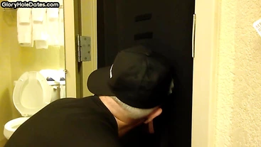 Gloryhole BJ DILF sucks cock with eager mouth near toilet