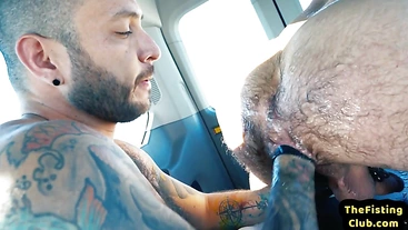 Rimjob jock fists hairy asshole of tattooed gaydaddy in van
