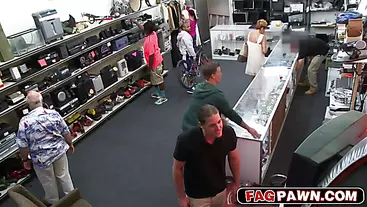 Black guy fucked in a hot threesome in a pawn shop